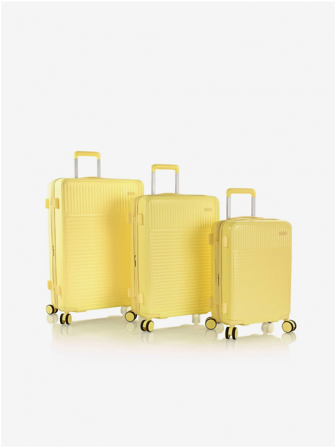 Sada tří cestovních kufrů v žluté barvě Heys Pastel S M L