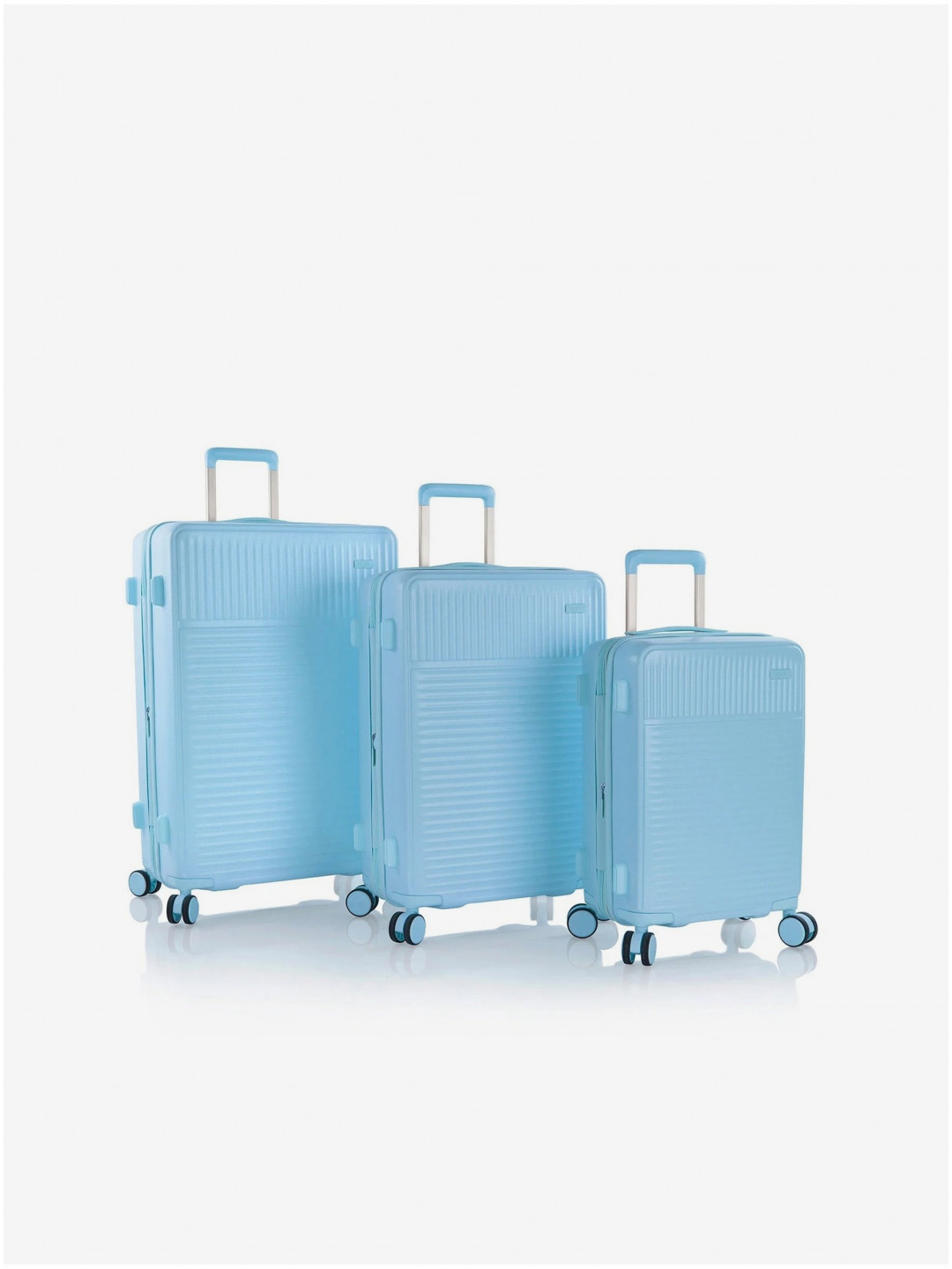 Sada tří cestovních kufrů v světle modré barvě Heys Pastel S M L