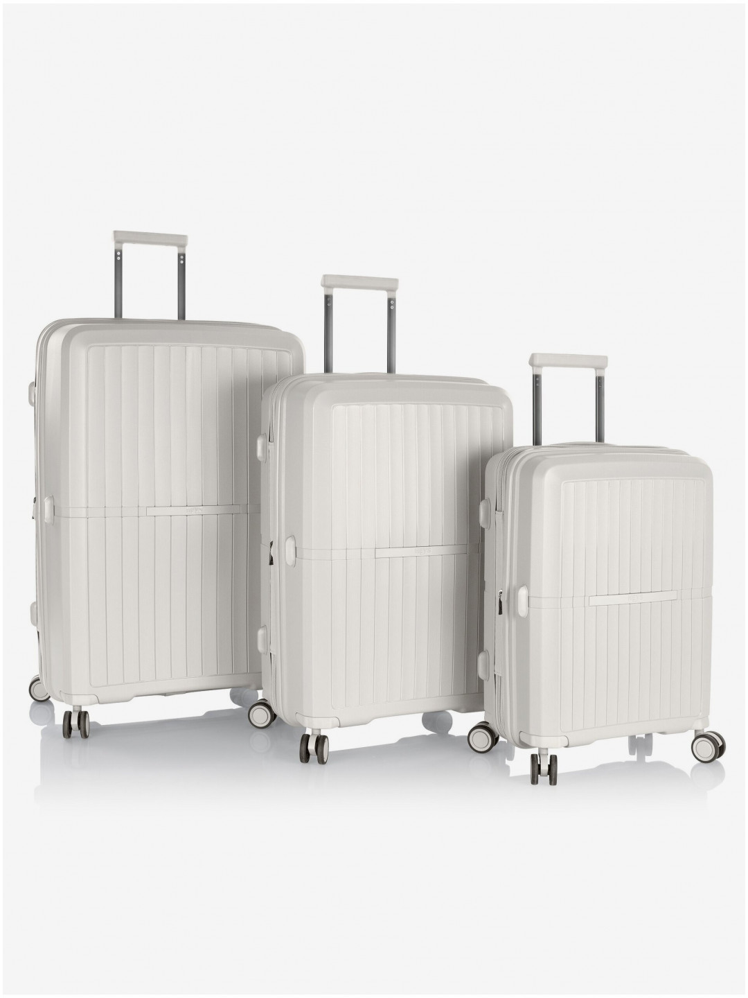 Sada tří cestovních kufrů v bílé barvě Heys Airlite S M L